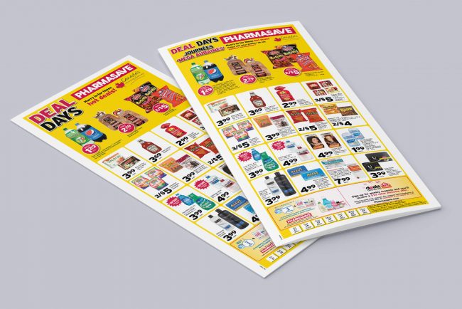 An English and a Bilingual Pharmasave Flyer laying on a grey surface